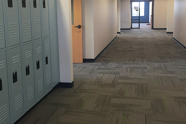 Carpet floor installation in a Houston school.