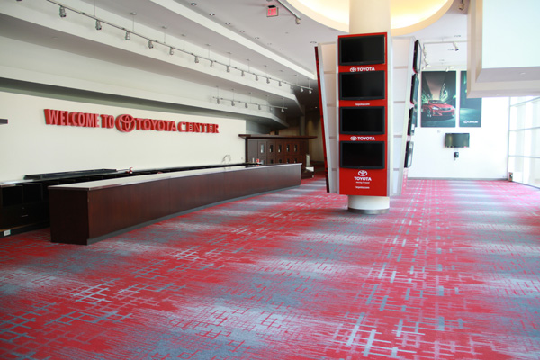 Carpet floor installation in a Houston sports arena.