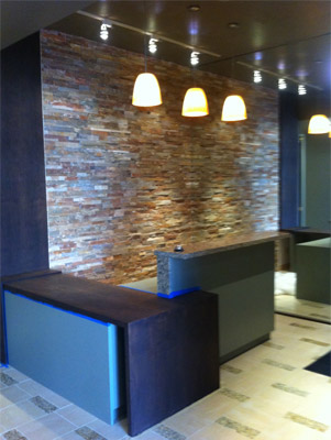 Ceramic tile and rock wall installation in Houston.