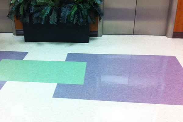 Vinyl Composition Tile (VCT) floor installation in Houston.